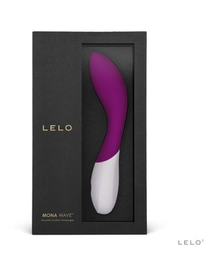 Purple and white massager in a black box with 'Lelo Mona Wave 8 G Spot Vibrator' branding on a white background