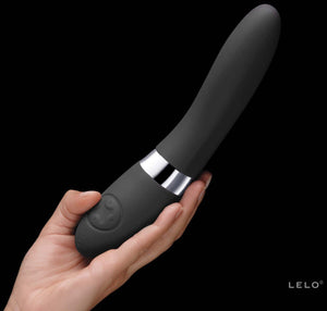Black silicone wand with silver base held in a hand against a black background, featuring the Lelo Elise 2 Deluxe Vibrator brand.