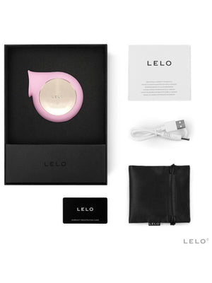 LELO Sila Cruise Sonic Massager product packaging with black box, pink device, USB cable, and black pouch on a white background.