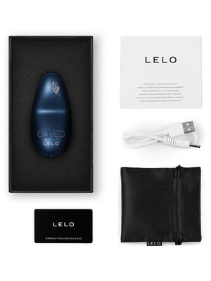 LELO Nea 3 Petite Vibrators product packaging with blue device, black box, USB cable, and user manual on a white background.
