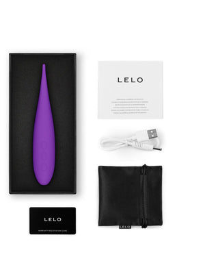 Purple LELO Dot Travel Device product with packaging, USB cable, and black pouch on a white background