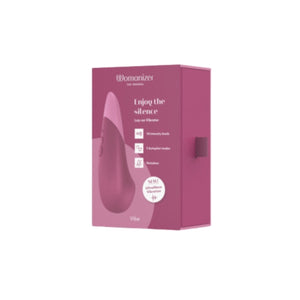 Pink packaging of a Womanizer Vibe Massager product on a white background