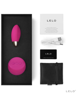 LELO product set with pink Lyla 2 SenseMotion Vibrator by LELO, black box, USB cable, and pouch on a white background