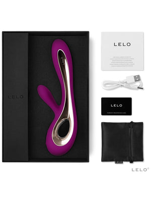 Purple and silver device with Lelo Soraya 2 Deluxe branding, packaging, and accessories on a white background