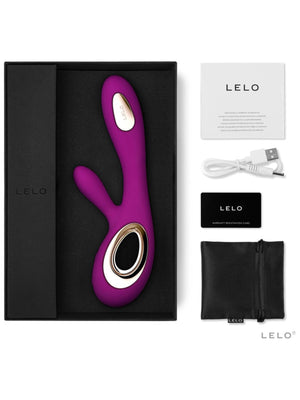Purple and gold Lelo Soraya Wave 8 Rabbit Vibrator with Lelo branding packaging, and accessories on a white background