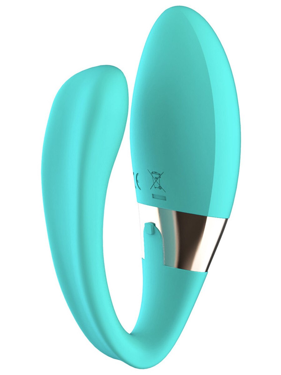 Turquoise silicone sheath with a metallic tool on a white background