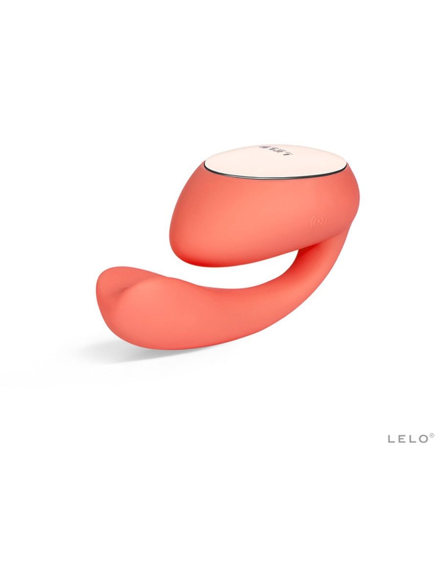 Coral-colored silicone ring with a white top on a white background, featuring the brand 'Lelo Ida Wave 3.7 Vibrator'.