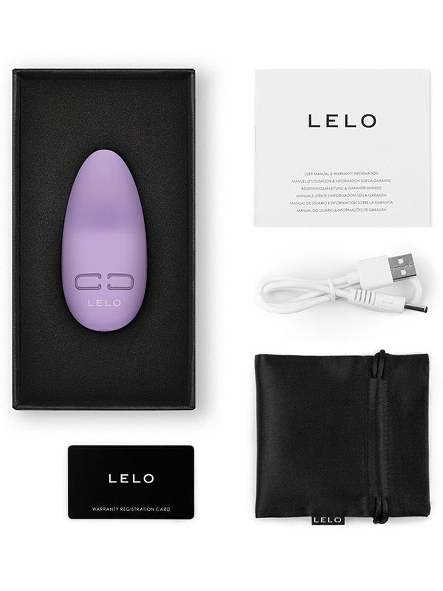 Purple LELO Lily 3 Personal Massager product with packaging, USB cable, and warranty card on a white background