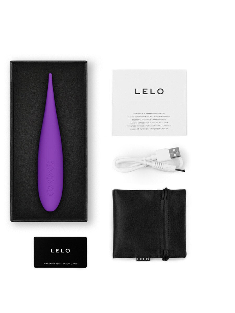 Purple LELO Dot Travel Device product with packaging, USB cable, and black pouch on a white background