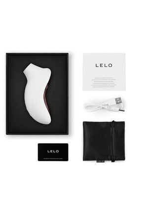 Lelo Sona 3 Sonic Massager product packaging with white device, black box, USB cable, and pouch on a white background