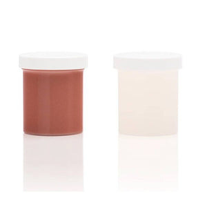 Two cylindrical containers with white lids on a white background