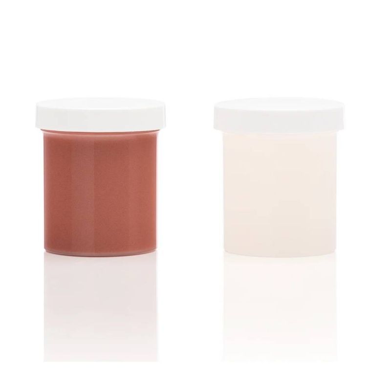 Two cylindrical containers with white lids on a white background