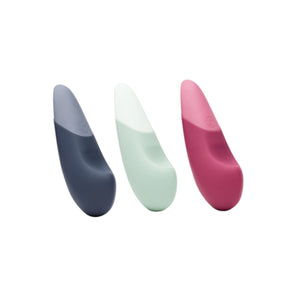 Womanizer Vibe Massager silicone products in gray, green, and pink on a white background