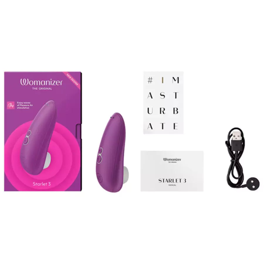 Purple Womanizer Starlet 3 with packaging, USB cable, and 'I Masturbate' card on a white background
